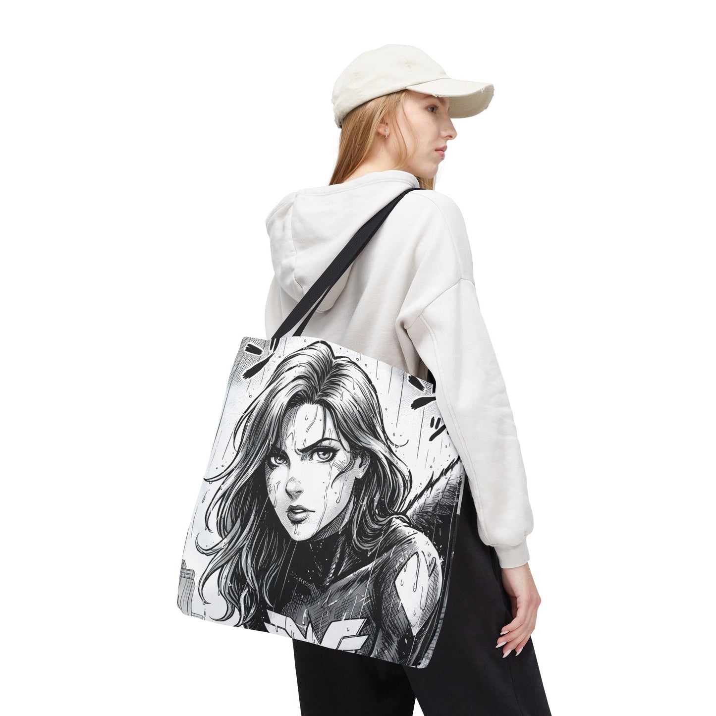 Person wearing a white hoodie with a tote bag featuring a black and white manga noir illustration of a woman's face.