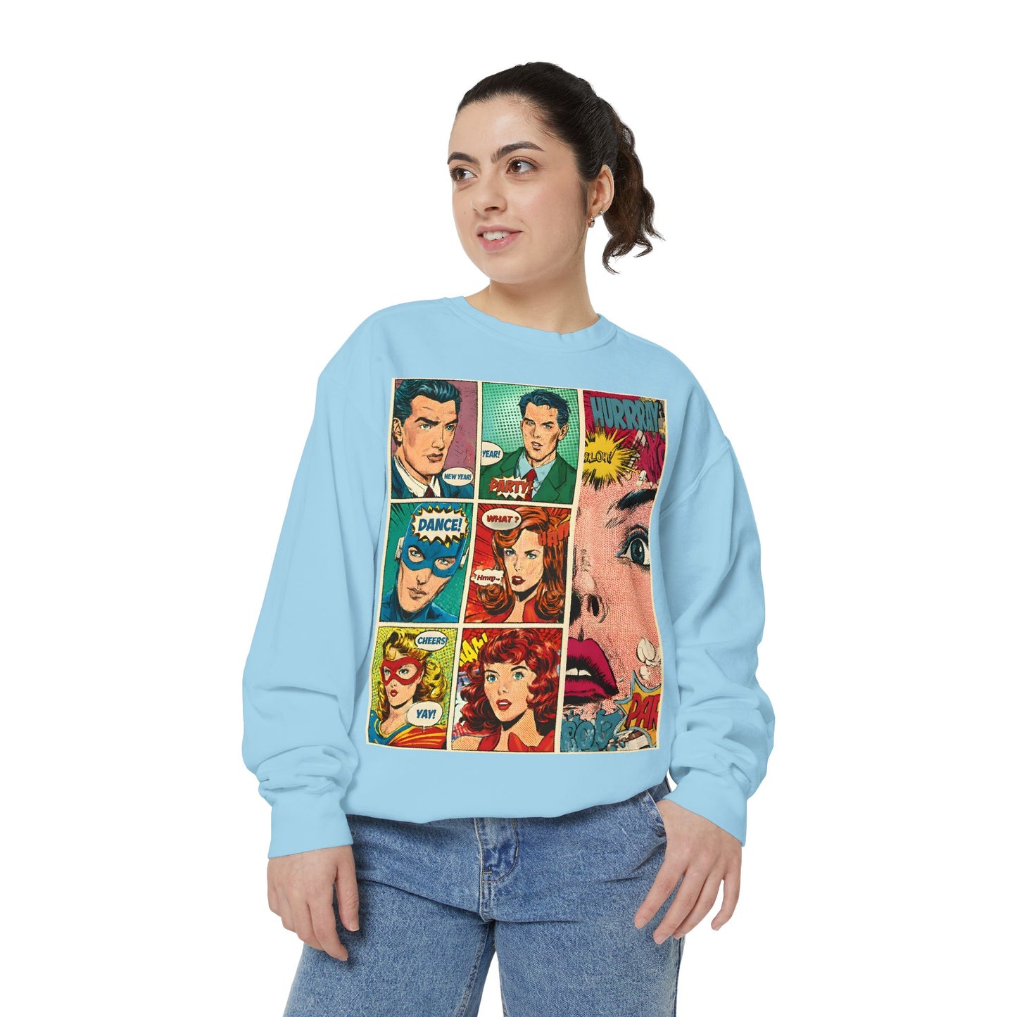 Person wearing a light blue sweatshirt with comic book character design on a white background