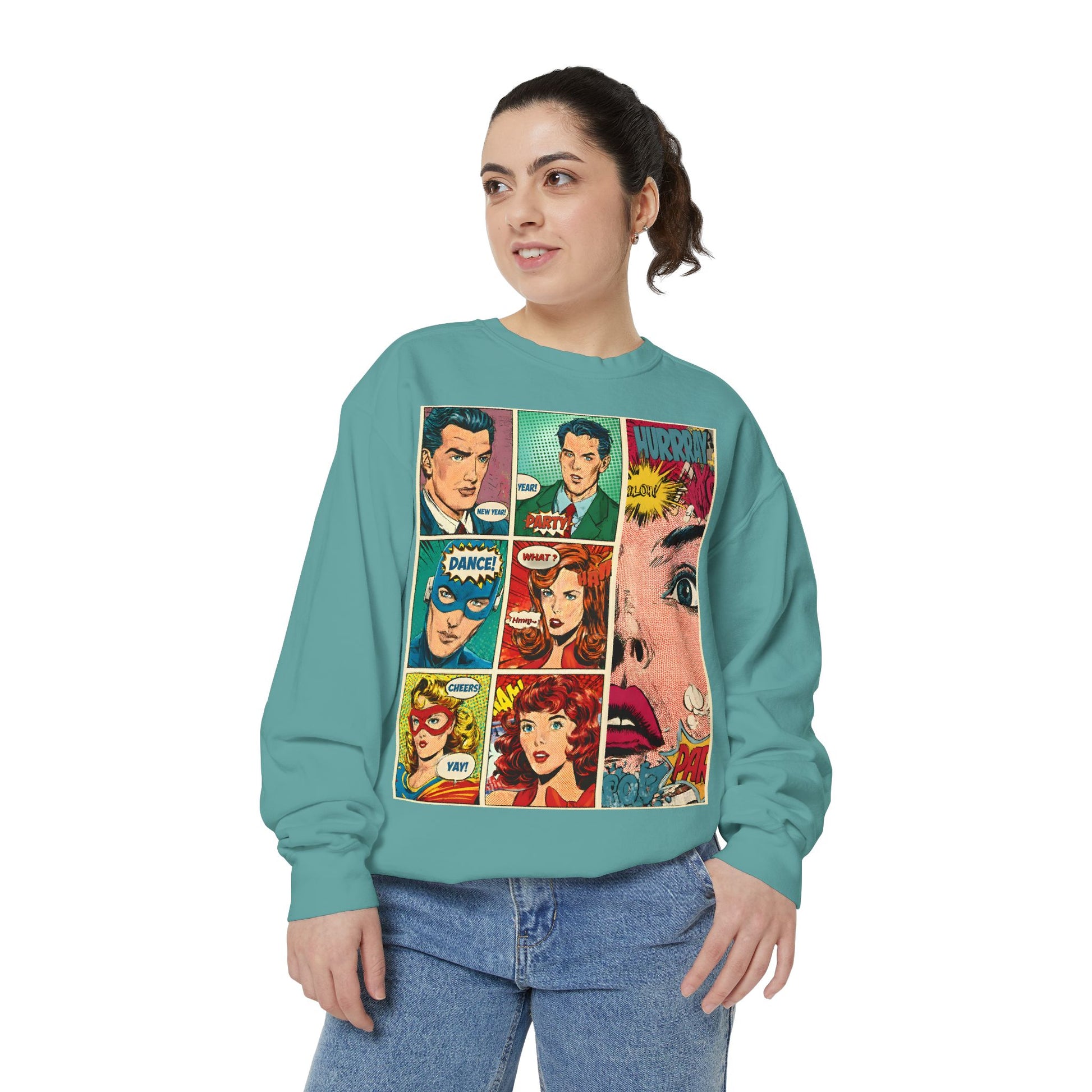 Person wearing a teal sweatshirt with comic book character design on a white background