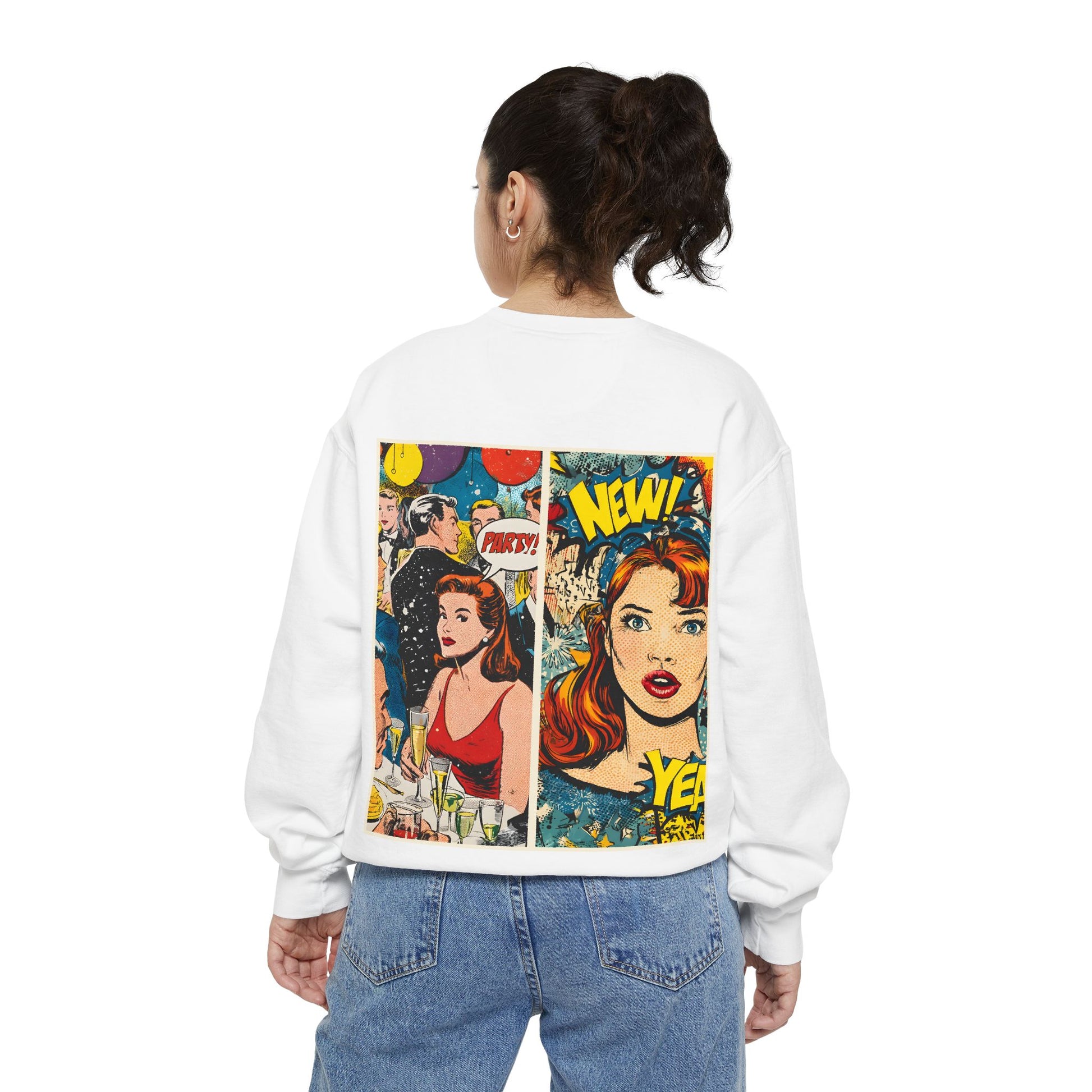 Person wearing a white sweatshirt with comic book-style graphics on the back, standing against a white background.