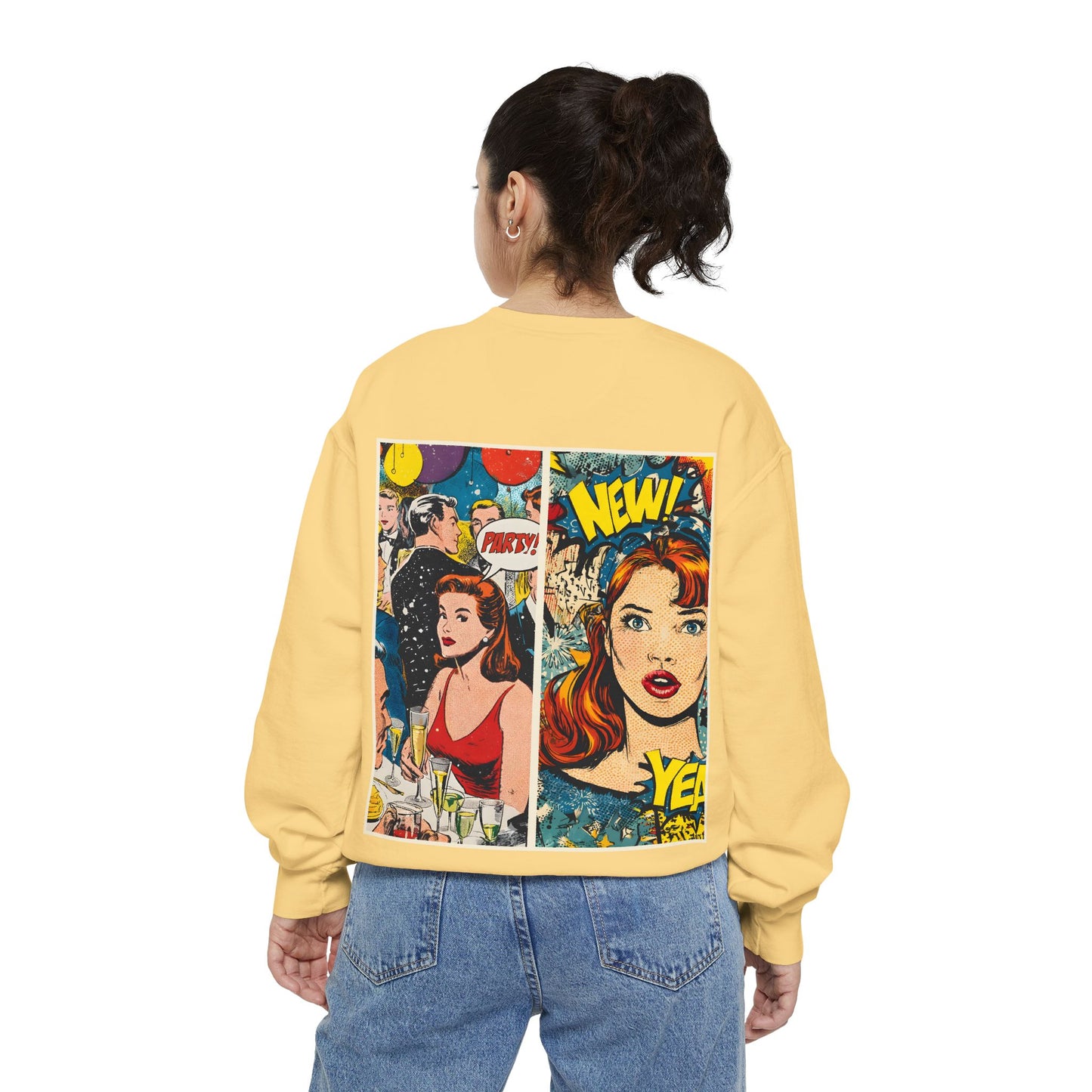 Person wearing a yellow sweatshirt with comic book-style graphics on a white background.Back view.