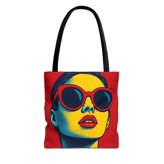Tote bag with a colorful pop art style graphic of a face wearing sunglasses on a white background