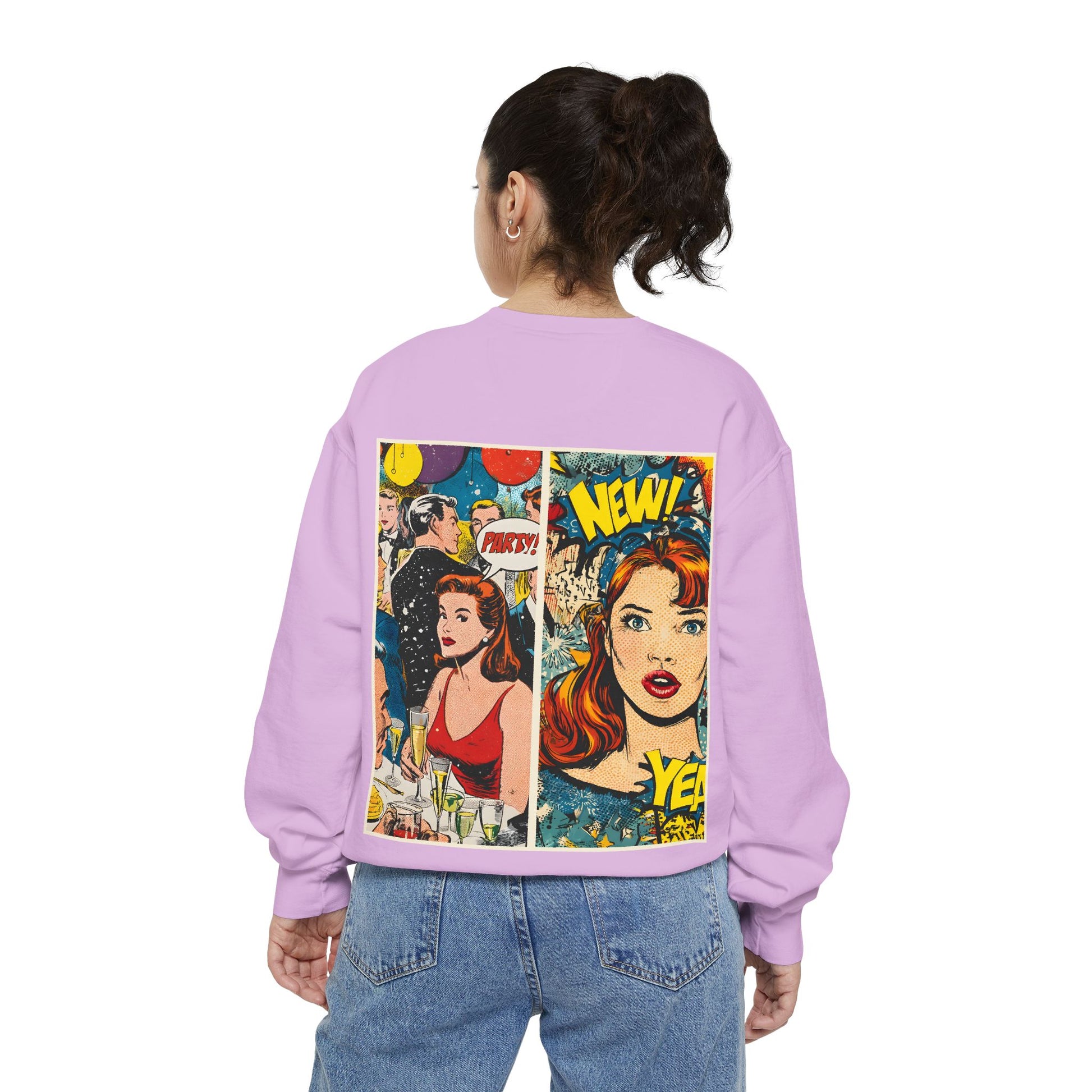 Person wearing a purple sweatshirt with comic book-style graphics on the back