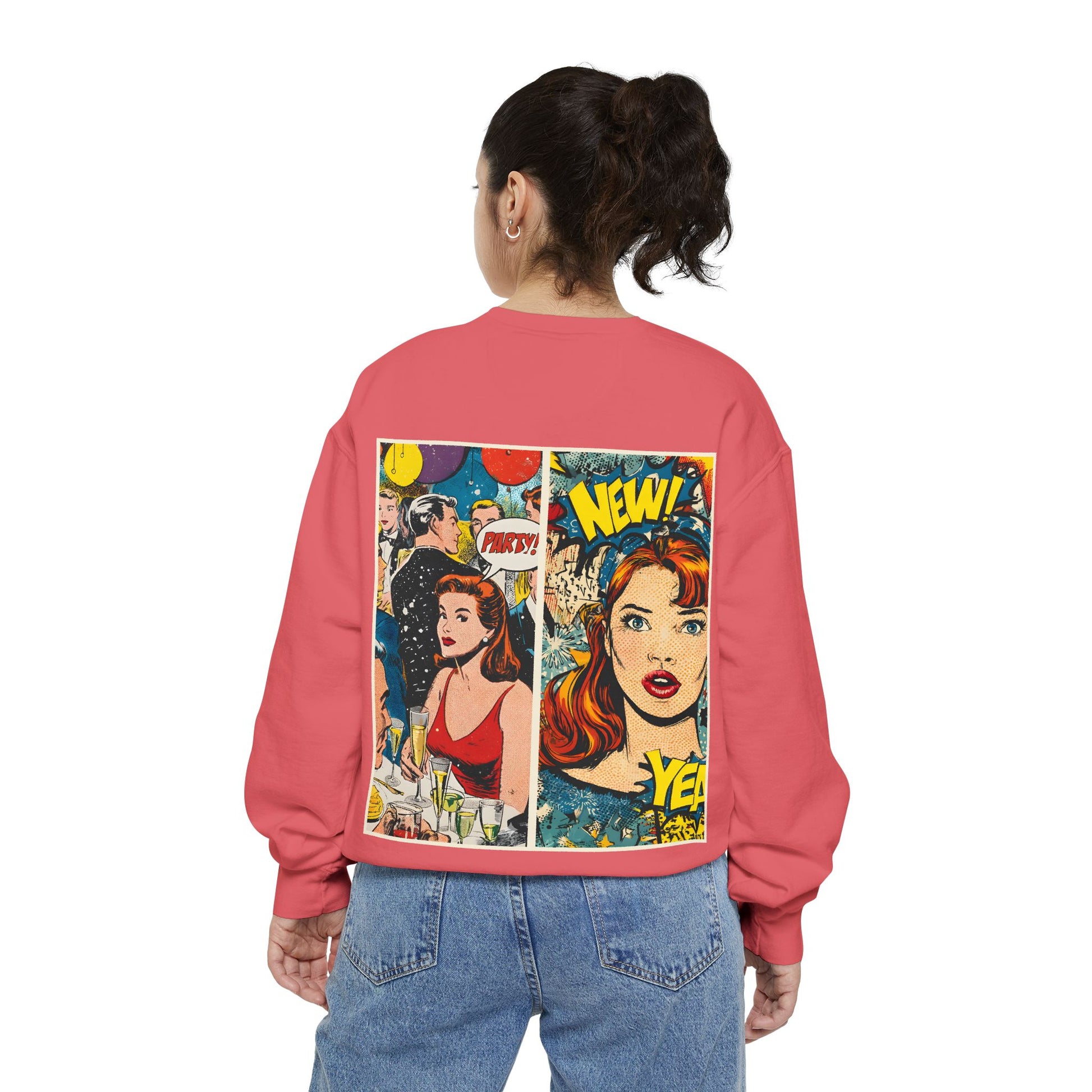 Person wearing a pink sweatshirt with comic book-style graphics on the back